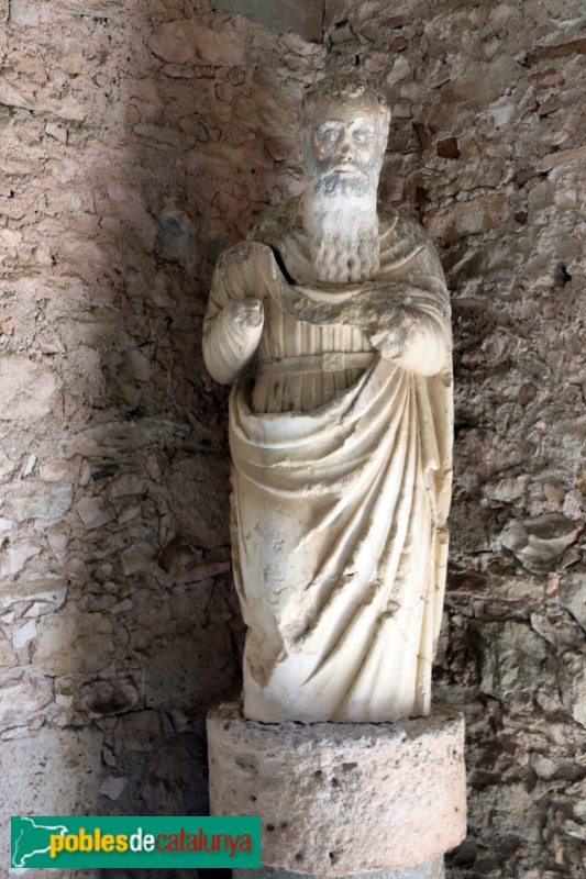 Monestir de Santes Creus - Claustre posterior, escultura a una cantonada (Foto: Albert Esteves, 2019) Monestir de Santes Creus - Claustre posterior, escultura a una cantonada