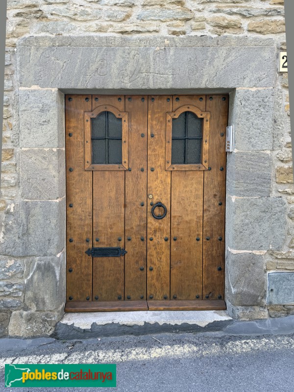 L'Esquirol - Cantonigròs. Carrer Major. Llinda de 1859