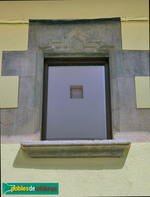 Sant Julià de Vilatorta - Carrer de la Mercè. Llinda de 1588