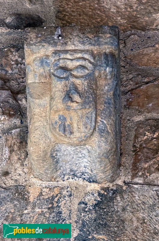 Isòvol - Església de Sant Pere d'Olopte. Mènsula de l'atlant